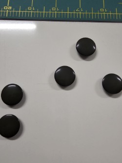 Runder Knopf schwarz